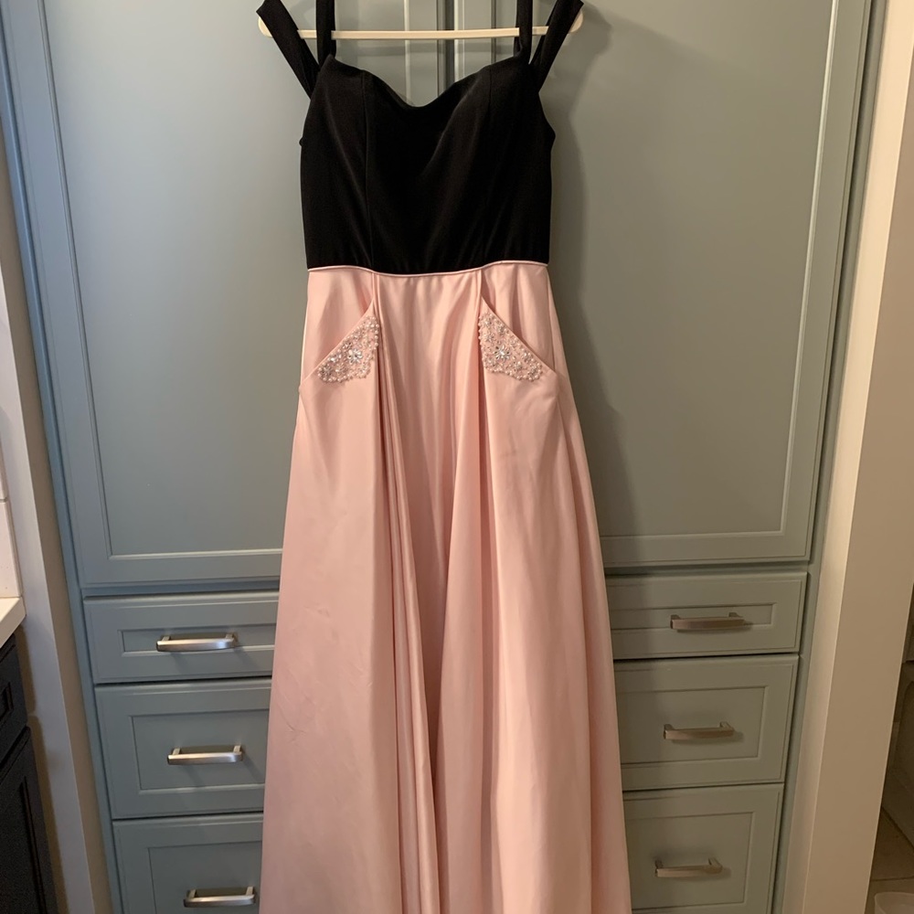 Long dress with pink skirt and black bodice. Size 9, purchased at Macy’s.